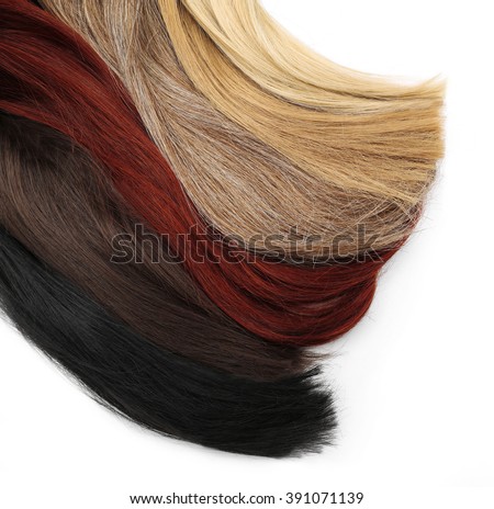 Varicolored strands of hair, isolated on white