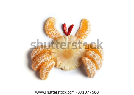 Food art creative concepts. Cute crab made tangerines, pineapple and strawberry isolated on white background