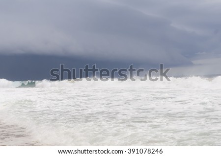 GRAND BASSAM, IVORY COAST (Côte d’Ivoire), AFRICA. Tropical storm in the Gulf of Guinea (Atlantic ocean) at the Azuretti beach of the Grand Bassam resort. Stock photo.