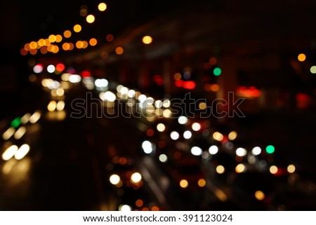 Abstract Car traffic at night. Motion blurred. Which urban city beautiful background.