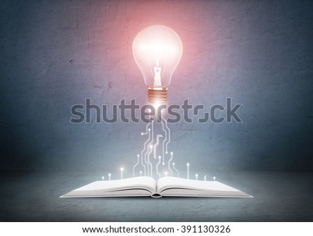Open book and glowing light bulb over it. Knowledge, education concept Royalty-Free Stock Photo #391130326