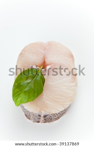 Fresh hake slice isolated over white background