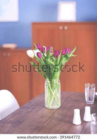 Beautiful bouquet of tulips on the table, close up