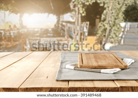 blurred background of desk napkin kitchen board and free space 