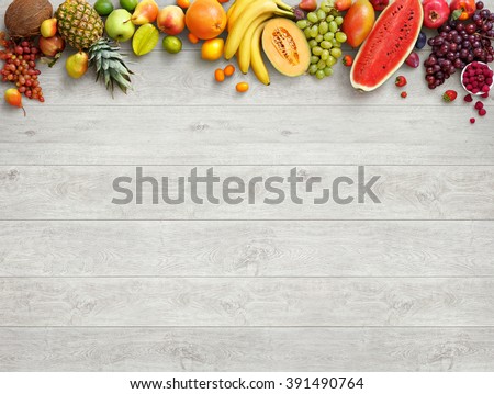 Healthy food background. Studio photo of different fruits on white wooden table. High resolution product. Royalty-Free Stock Photo #391490764