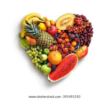 Heart symbol. Fruits diet concept. Food photography of heart made from different fruits isolated white background. High resolution product