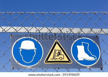 Safety signs on an industrial site