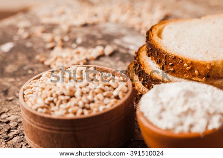fresh wheat grains and flour.Slices of bread