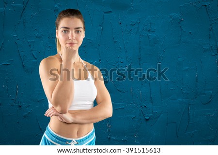 Beautiful fitness woman standing