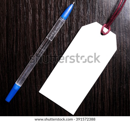 price tag on wooden background.Blank tag.marketing concept.