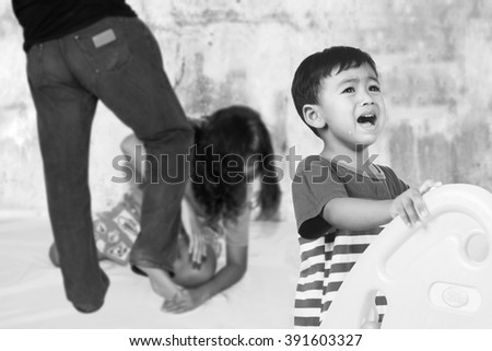 family fight concept, boy crying with his parent fighting