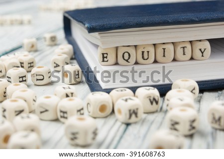 EQUITY word written on wood block. Wooden Abc Royalty-Free Stock Photo #391608763