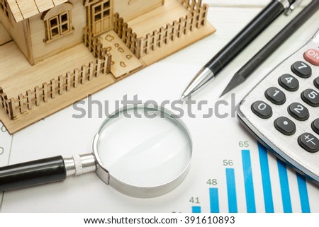 Model house, construction plan for house building, calculator. Real Estate Concept. Top view.