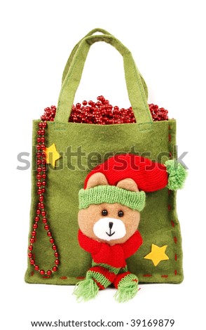 Green christmas bag and shiny red beads