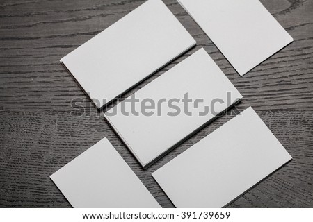 stack of business cards, calling card on wooden table