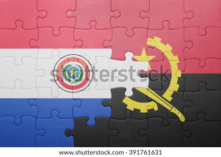 puzzle with the national flag of angola and paraguay . concept
