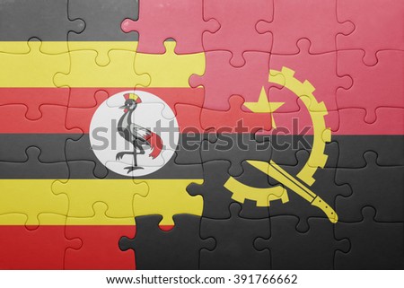 puzzle with the national flag of angola and uganda . concept