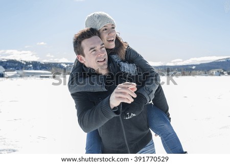 A Couple In winter Snow Scene at beautiful sunny day
