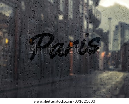 Paris written on a foggy window Royalty-Free Stock Photo #391821838