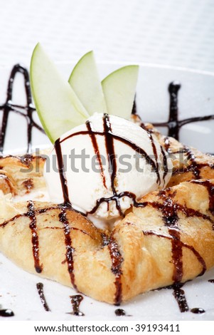 apple  cake and ice-cream on a white plate