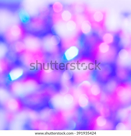 Blue and pink bokeh glitter defocused lights abstract background
