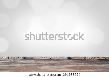 Old  wood table top on colorful blurred light abstract background . use  for display or montage your products