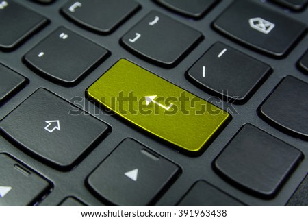 Close-up the Enter symbol and have Yellow color button isolate black keyboard