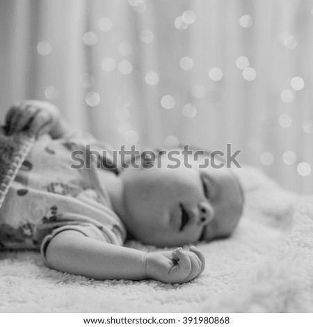 Picture of cute baby resting with mouth open