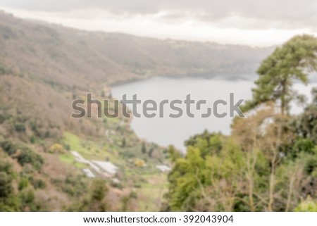 Defocused background of the Lake Nemi near Rome, Italy. Intentionally blurred post production for bokeh effect