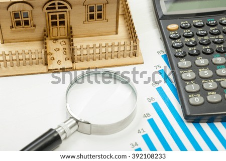 Model house, construction plan for house building, calculator. Real Estate Concept. Top view.
