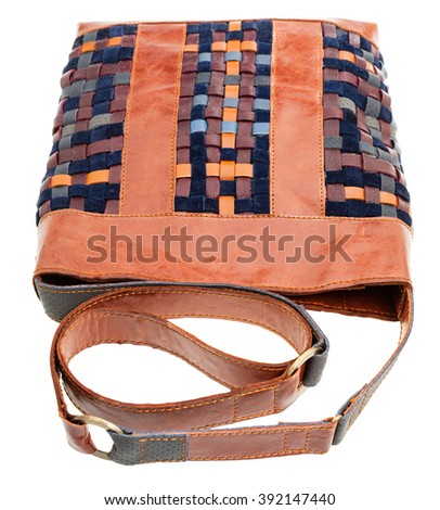 cross-body handbag from intertwined leather strips isolated on white background