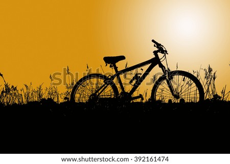 silhouette of bicycle at sunset