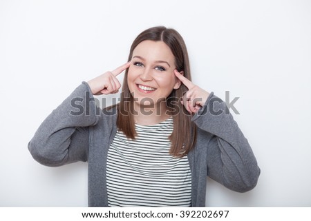 Young woman having a great idea, on white background