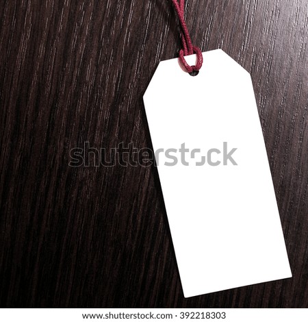 price tag on wooden background.Blank tag. marketing concept.