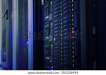 modern mainframe disk storage in the data center Royalty-Free Stock Photo #392228494