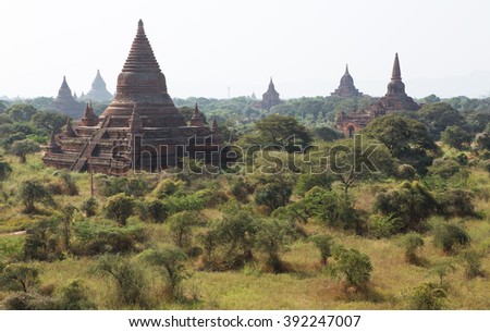 Group of ancient temples and pagoda with scenic bright white sky background at Old Bagan , Myanmar