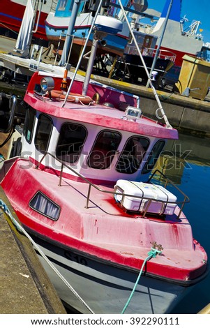 red and white boat in port, standing  ,terminal ,white, water, transportation,  international, cruise, travel, cargo, rope, docked, seaside, sky, blue, maritime, marine ,oil, harbor, industry 