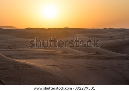 Bright sunset in the Arabian Desert near Dubai