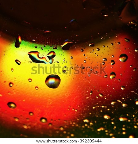 Oil drops on a water surface.
Beautiful colorful abstract background.