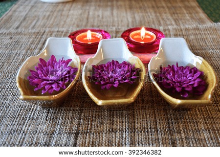 Candles with pink flower in mini boat decorations