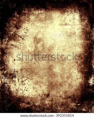 Grunge vintage scratched texture background with faded central area for your text or picture