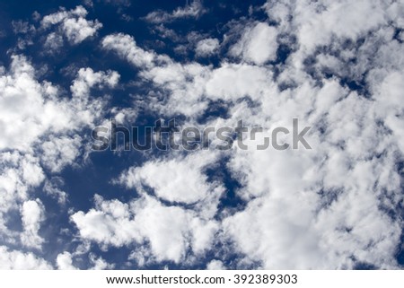 Dreamy white cirro -stratus and cumulus  clouds in a blue Australian autumn sky  indicate fine weather ahead .