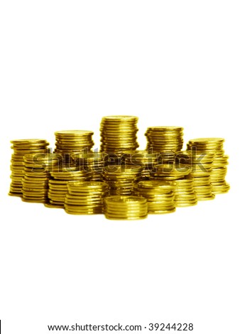 Stacks of gold coins, isolated over white background. Shallow DOF.