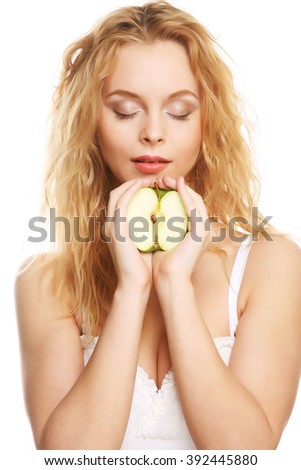 happy woman with green apple 