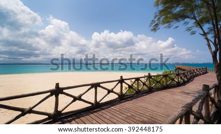 In the picture the beautiful wooden bridge leading to the beach on the island of slaves, Zanzibar Republic of Tanzania