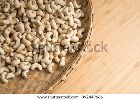 Cashew Nut wood background selective focus