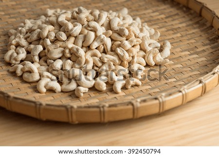 Cashew Nut wood background selective focus