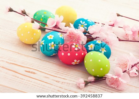 Easter background. Colorful easter eggs with pattern flowers. Top view, horizontal. Poster, mock up for design. Selective focus