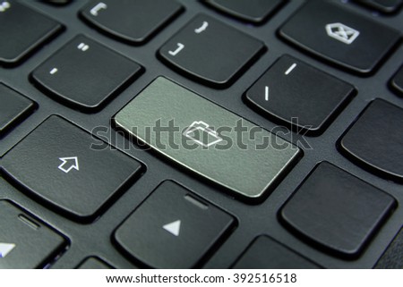 Close-up the Folder symbol on the keyboard button and have Beige color button isolate black keyboard