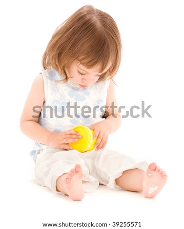 picture of little girl with yellow modeling foam over white